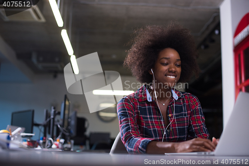 Image of portrait of a young successful African-American woman in modern 