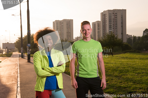 Image of Portrait of romantic pretty couple on fitness session, outside t