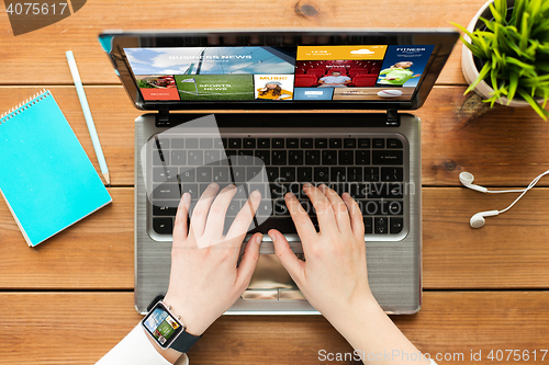 Image of close up of woman or student typing on laptop