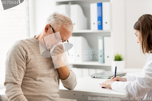 Image of senior man and doctor meeting at hospital