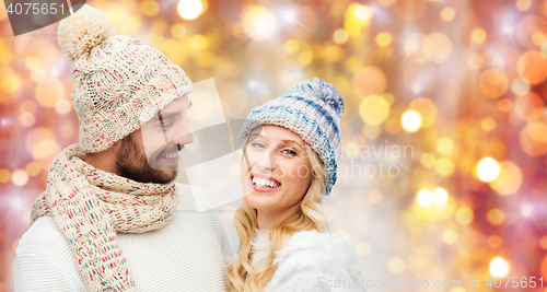 Image of smiling couple in winter clothes