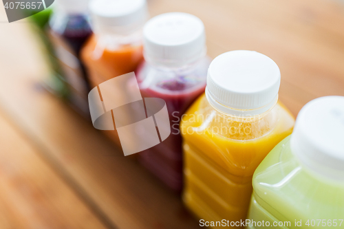 Image of bottles with different fruit or vegetable juices