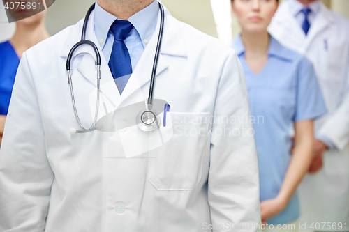 Image of close up of medics or doctors at hospital