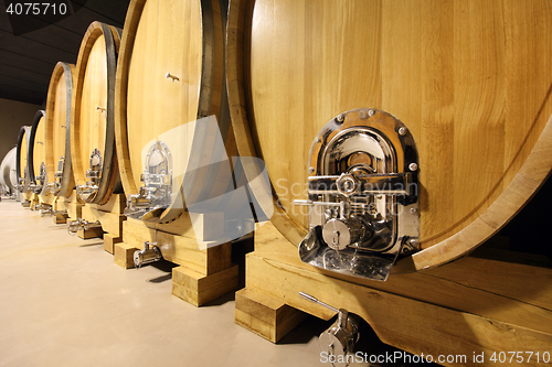 Image of wine barrels in a wine cellar