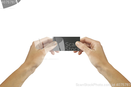 Image of hand holding blank paper business card