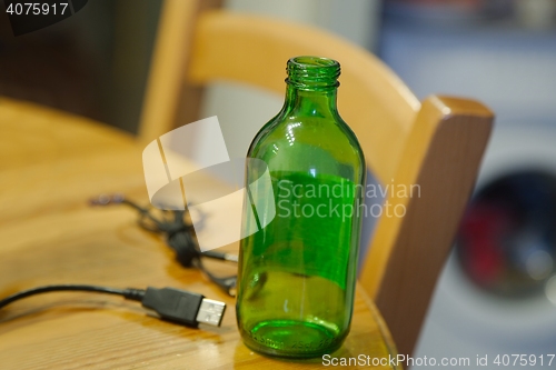 Image of Empty bottle on table