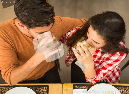 Image of Young couple at the restaurant