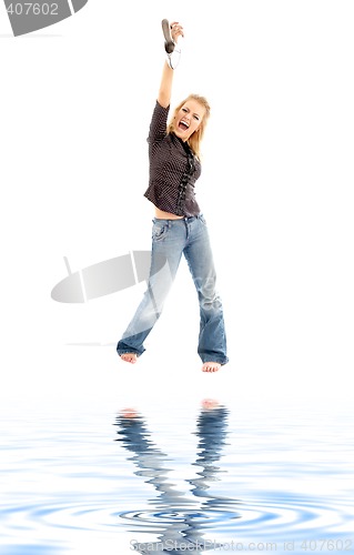 Image of screaming blond with shoe on white sand