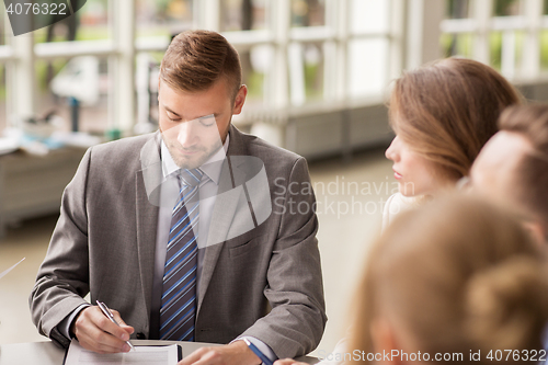 Image of business people meeting at office