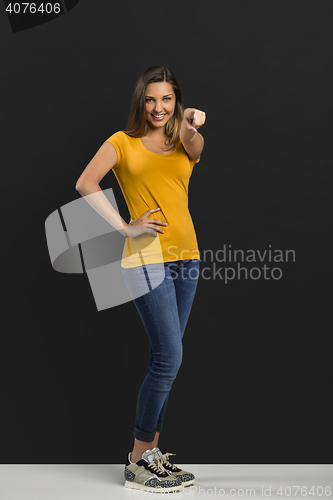 Image of Beautiful woman pointing