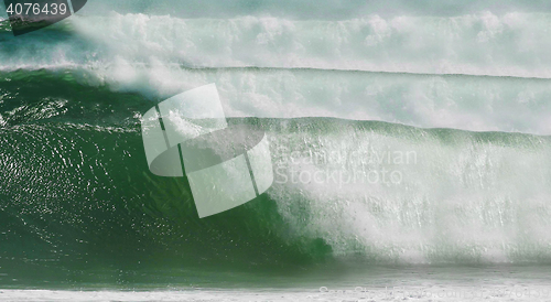 Image of rough colored ocean wave