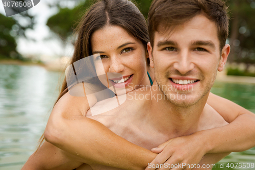 Image of Young couple having fun