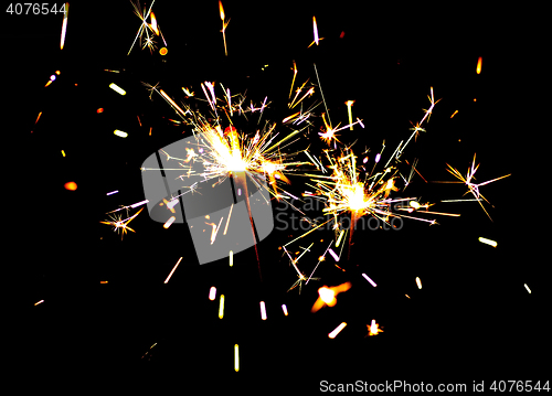 Image of Two bright festive New Year Christmas sparklers