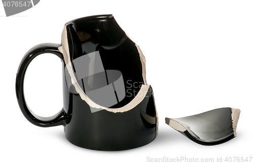 Image of Broken black porcelain cup with one fragment