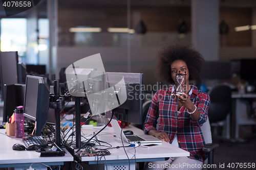 Image of portrait of a young successful African-American woman in modern 