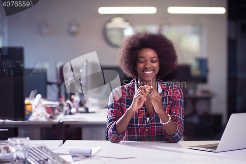 Image of portrait of a young successful African-American woman in modern 