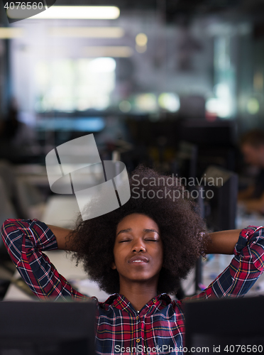 Image of portrait of a young successful African-American woman in modern 