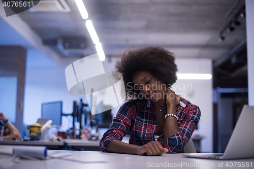 Image of portrait of a young successful African-American woman in modern 