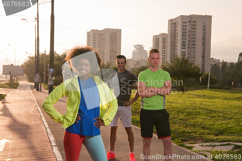 Image of portrait multiethnic group of people on the jogging