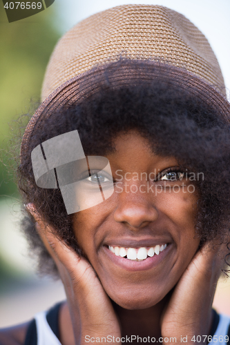 Image of Close up portrait of a beautiful young african american woman sm