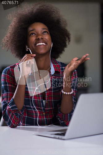Image of portrait of a young successful African-American woman in modern 