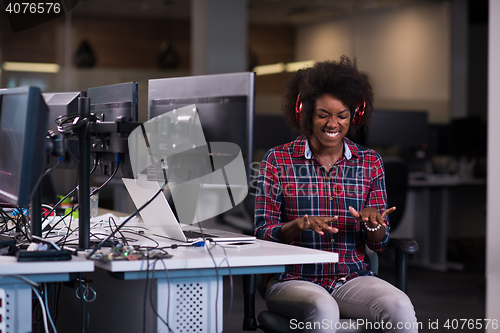 Image of portrait of a young successful African-American woman in modern 