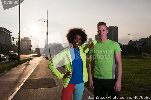 Image of Portrait of romantic pretty couple on fitness session, outside t