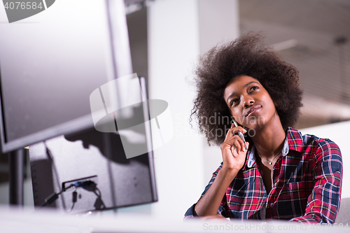 Image of portrait of a young successful African-American woman in modern 