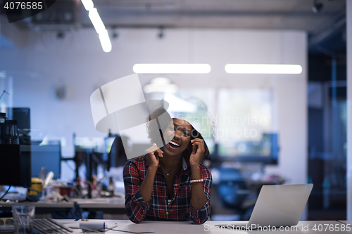 Image of portrait of a young successful African-American woman in modern 