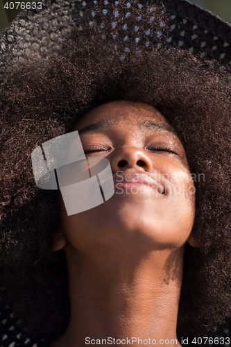 Image of Close up portrait of a beautiful young african american woman sm