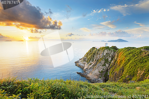 Image of Hong Kong lighthouse during sunrise