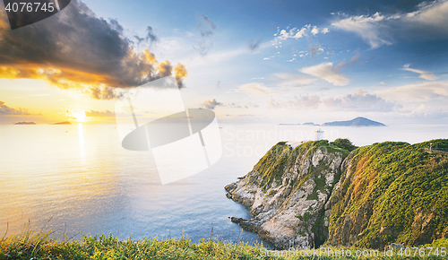 Image of Hong Kong lighthouse during sunrise