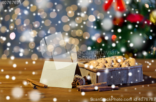 Image of close up of christmas oat cookies on wooden table