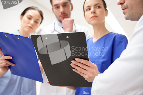 Image of close up of doctors with clipboard at hospital