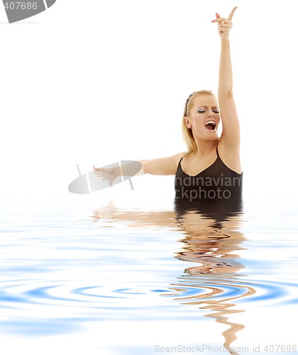 Image of singing blonde in water