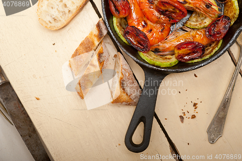 Image of roasted shrimps with zucchini and tomatoes