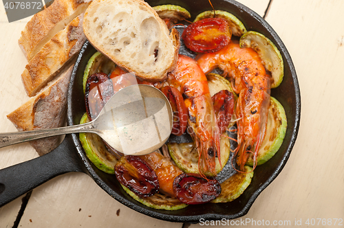 Image of roasted shrimps with zucchini and tomatoes