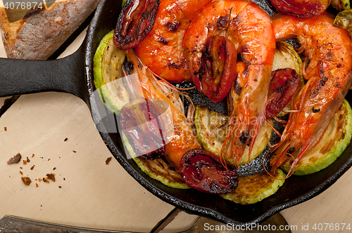 Image of roasted shrimps with zucchini and tomatoes