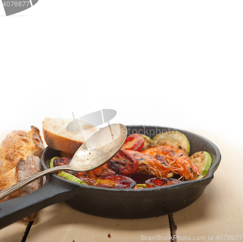 Image of roasted shrimps with zucchini and tomatoes