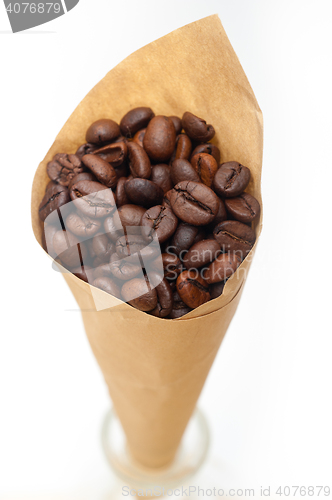 Image of espresso coffee beans on a paper cone