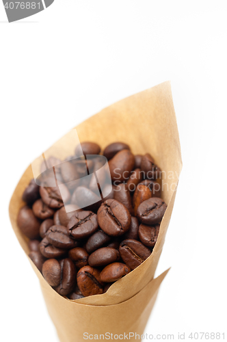 Image of espresso coffee beans on a paper cone