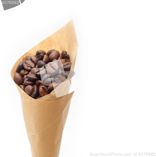 Image of espresso coffee beans on a paper cone