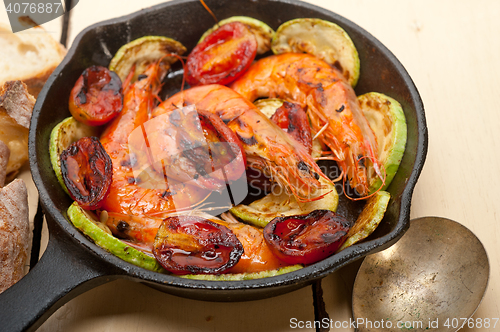 Image of roasted shrimps with zucchini and tomatoes