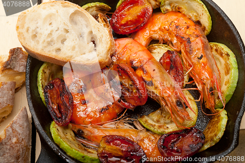 Image of roasted shrimps with zucchini and tomatoes