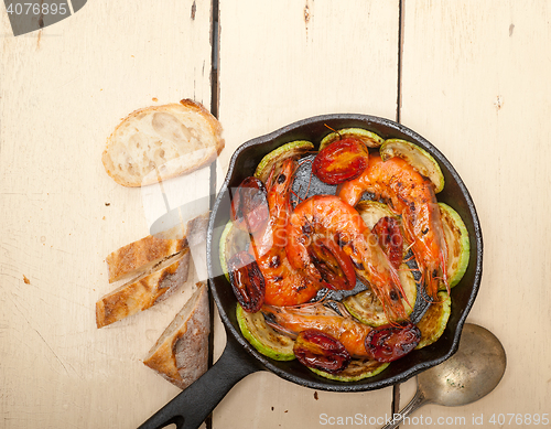 Image of roasted shrimps with zucchini and tomatoes