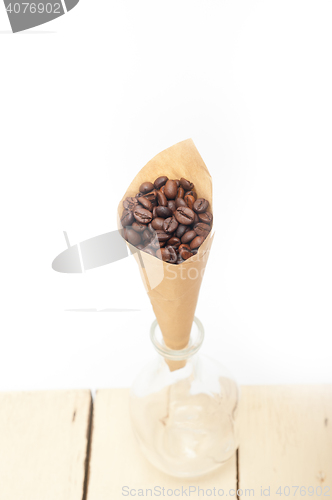 Image of espresso coffee beans on a paper cone