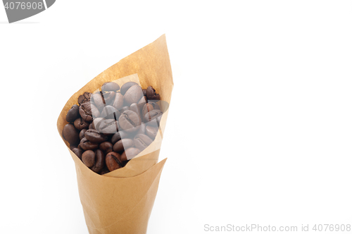 Image of espresso coffee beans on a paper cone