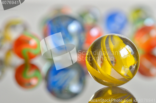 Image of close up of a bunch of marbles