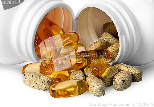 Image of Vitamins and fish oil capsules together
