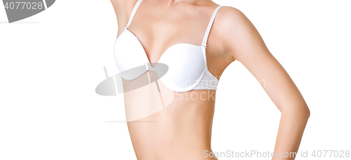 Image of Young woman in white bra